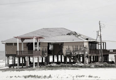 Wind damage - spray foam can help prevent uplift to Beaumont roofs